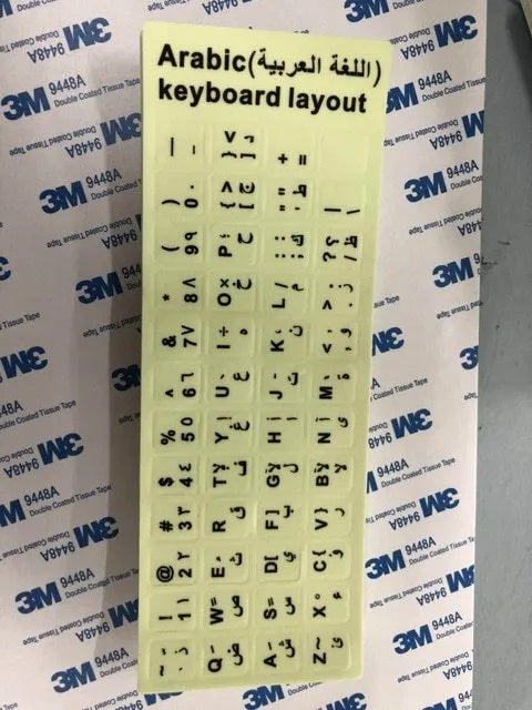 Yellow glowing PVC keyboard stickers with Arabic, Thai, Hebrew, French, Italian, and German language characters