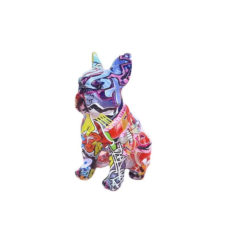Graffiti finish resin French bulldog statue measuring 17cm in height on display surface
