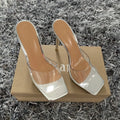 Women's black and silver PVC high heel boots with pointed toe design