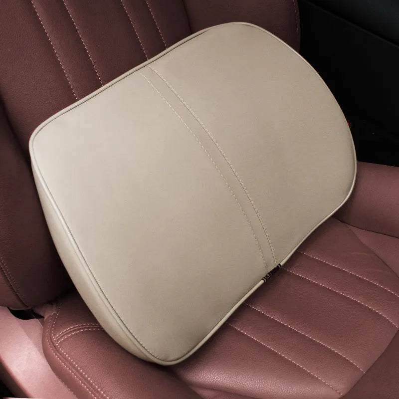 Memory foam car headrest with leather exterior in solid colour options