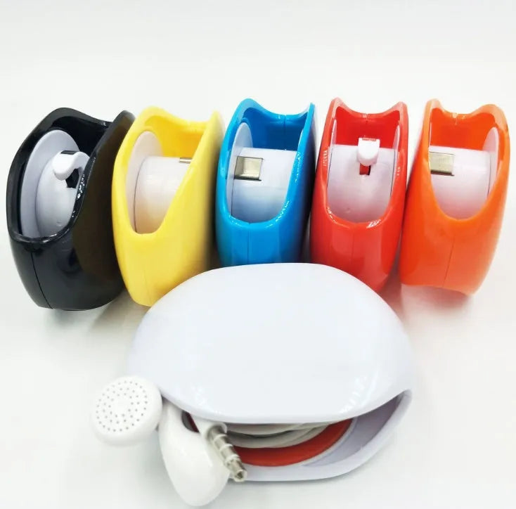 Automatic earphone cable winder showing white, blue, and black units with cable retracted into 72mm storage box.