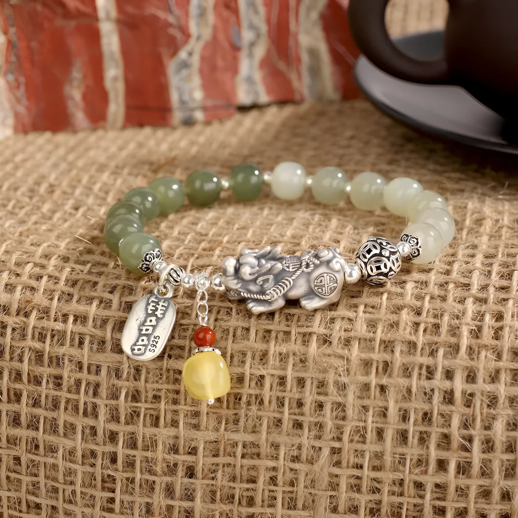 Pure silver coin bracelet with 8x7mm Hetian jade centrepiece in retro women's jewellery design