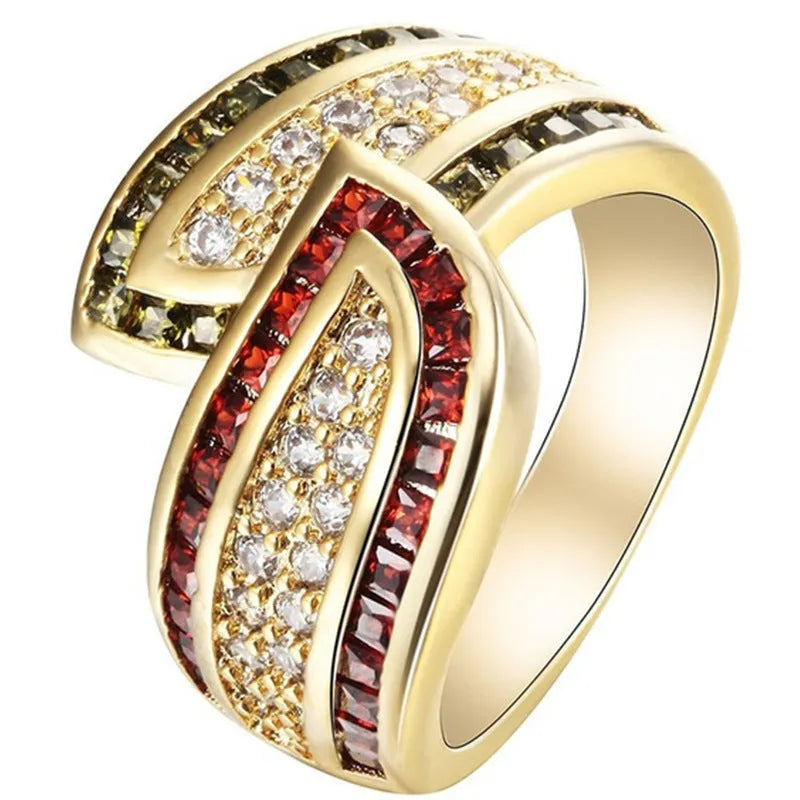 Gold-coloured peridot fashion ring for women on a white background.