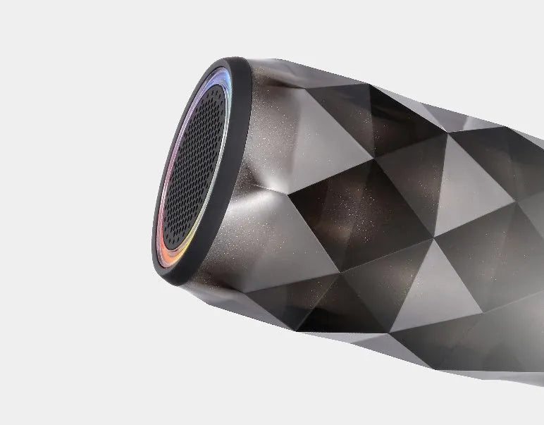 Black crystal diamond cut Coke can shaped lantern Bluetooth speaker with colourful starry sky lighting effect.