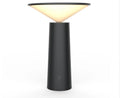 Black USB rechargeable desk lamp with touch sensor base and a tilted lamp head on a wooden desk.