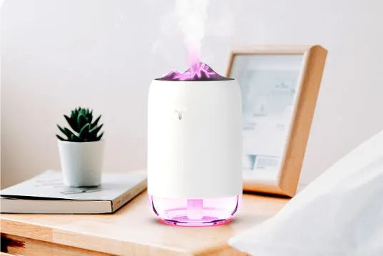 Mini USB ultrasonic humidifier 260ml with night light in turquoise green on a desk