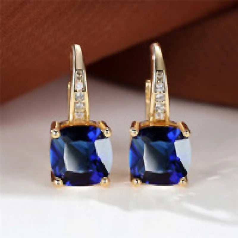 Geometric ear clips with square colourful moissanite inlays and electroplated gold finish