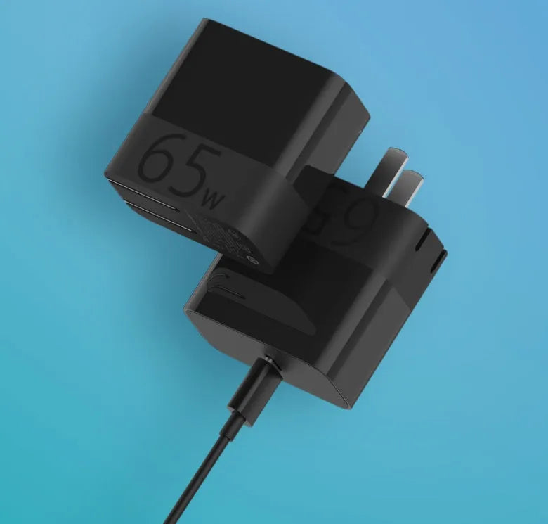Black ZMI USB-C 65W notebook power adapter showing compact design
