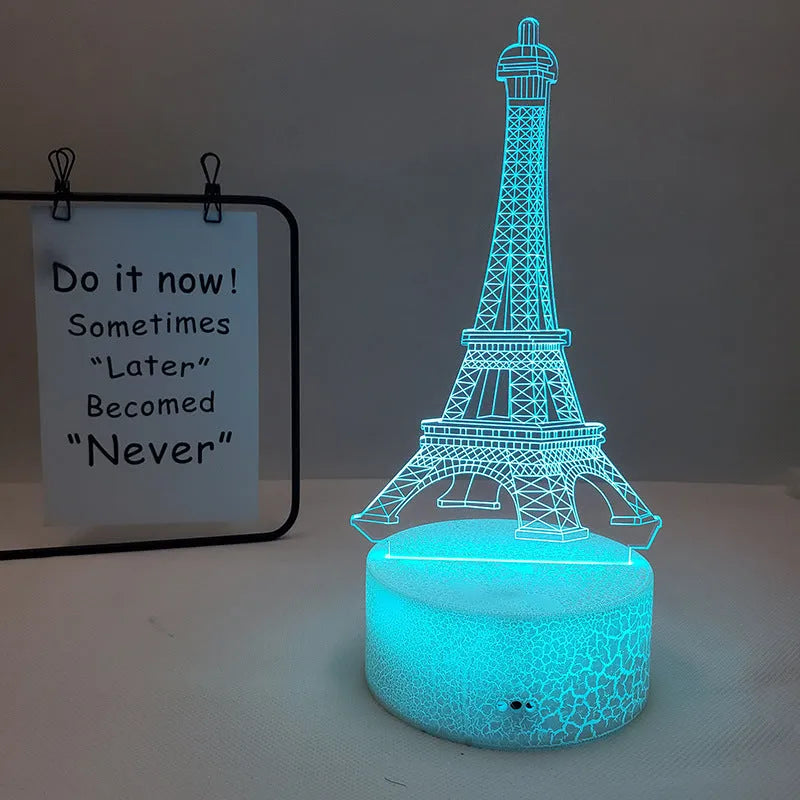 Eiffel Tower themed table lamp with multicolour LED glow on a acrylic shade.