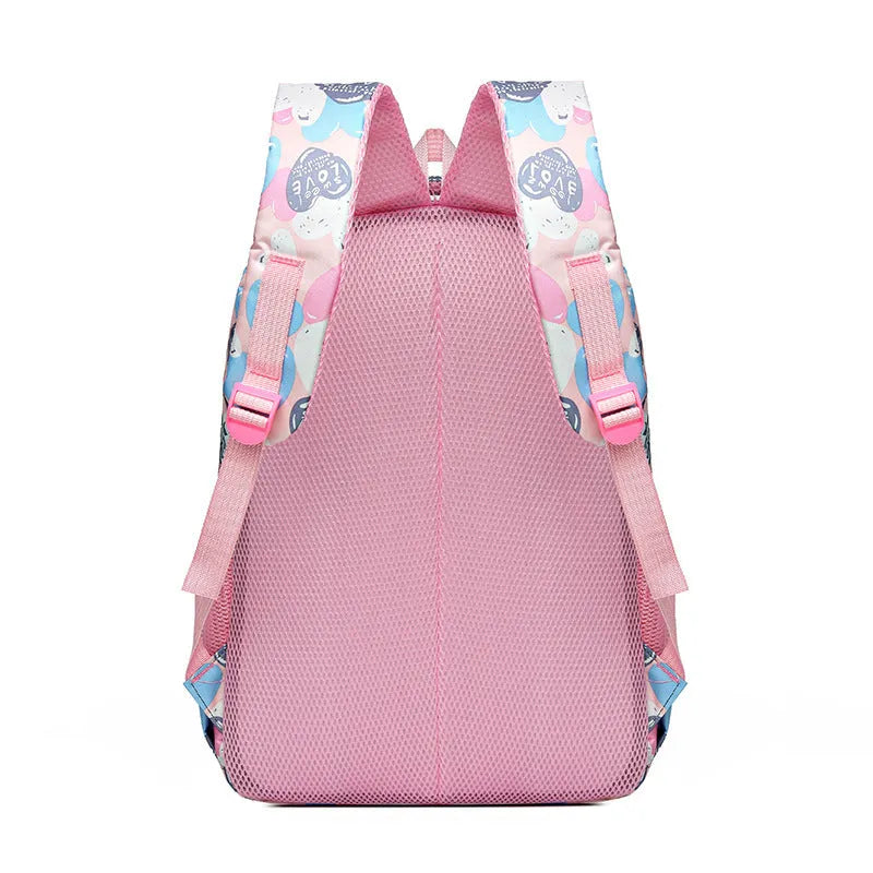 Blue student backpack with air pillow shoulder straps and large main compartment.