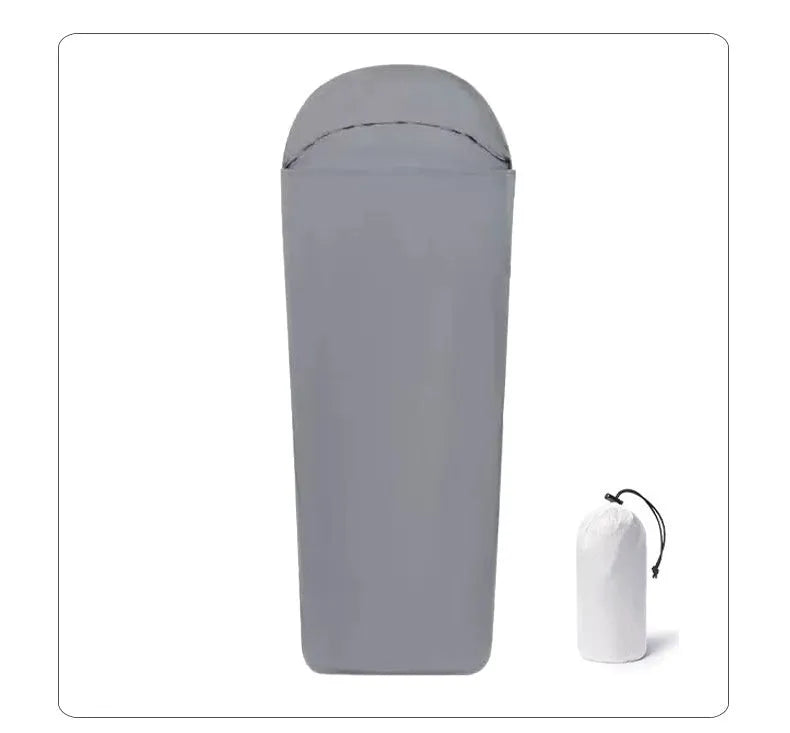 Blue mummy-style nylon camping sleeping bag shown rolled, highlighting its tapered 210cm length and compact design.