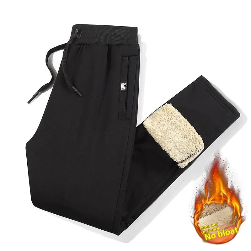 Men's grey fleece-lined cotton track pants with elastic waistband in oversized fit