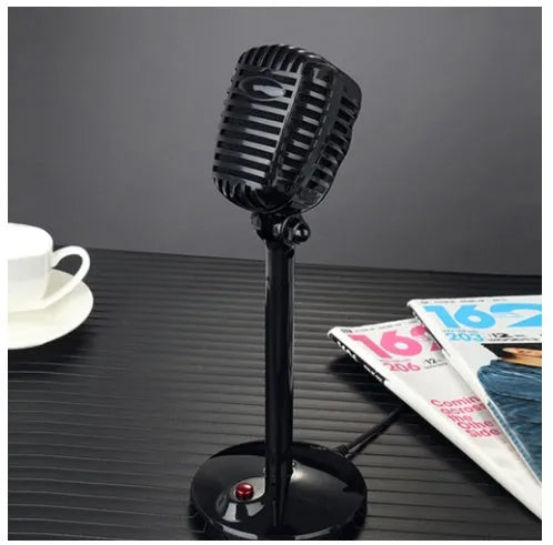 Black USB computer microphone with adjustable neck stand on desktop