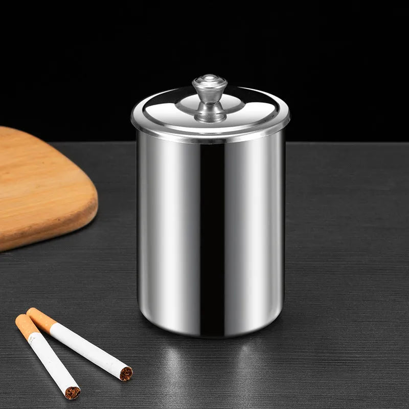 Stainless steel fly ash ashtray with cover measuring 7.5 by 9.5 centimetres