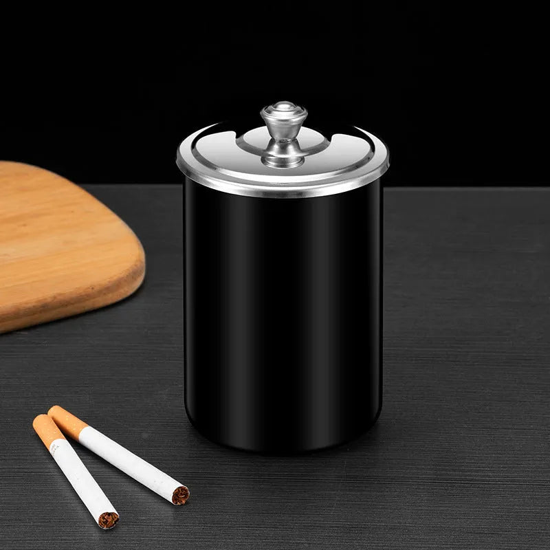 Stainless steel fly ash ashtray with cover measuring 7.5 by 9.5 centimetres