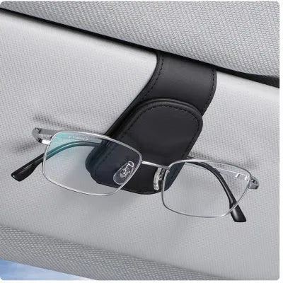 PU leather car sunglasses holder clip attached to a sun visor in beige colour