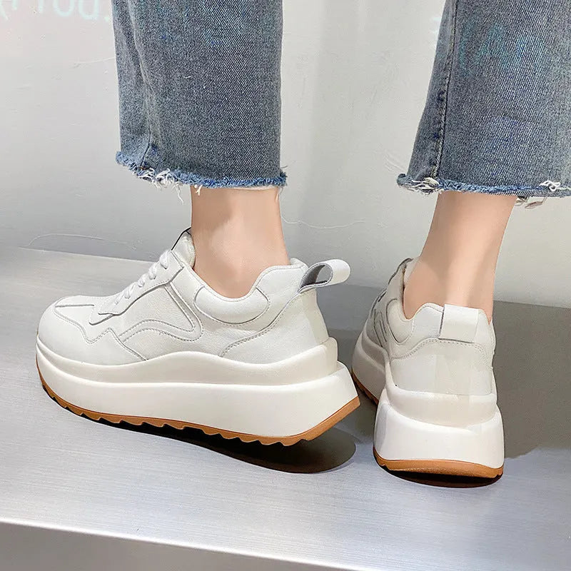 Women's white low-top leather casual shoes with cross strap and English muffin heel