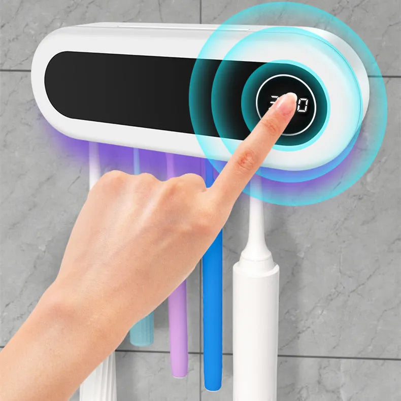 Ivory White wall mounted UV toothbrush steriliser holder with digital display and toothpaste squeezer.