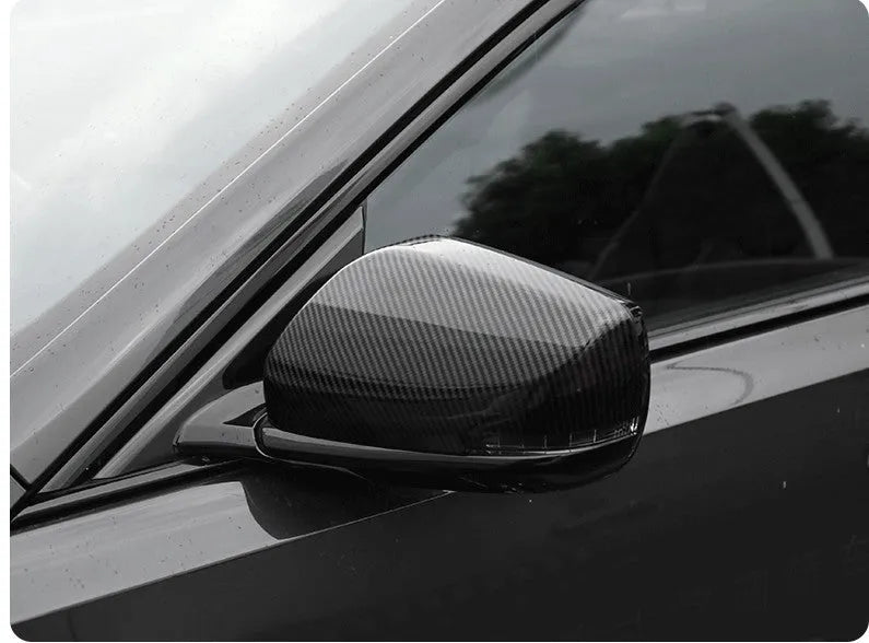 ABS plastic rearview mirror cover for Cadillac CT5 and CT6 models in carbon fibre, silver, or rain frame pattern.