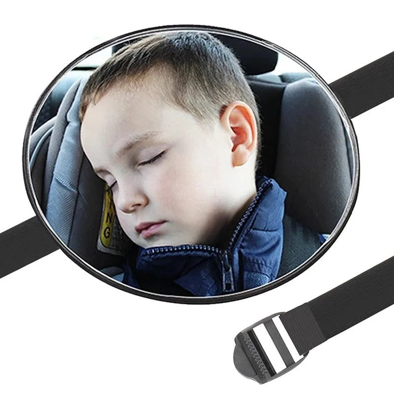 Black ABS baby safety seat rearview mirror with circular 17cm glass and adjustable strap on car headrest.