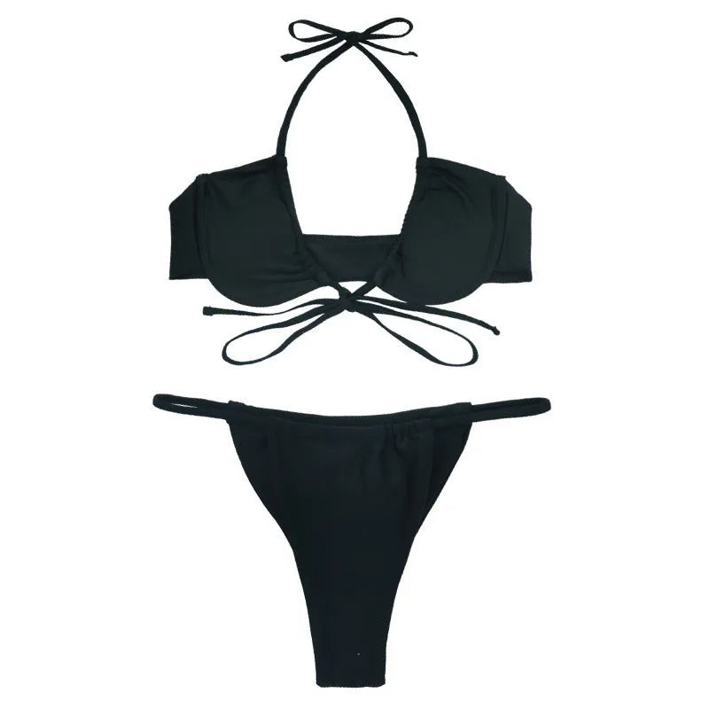 Women's black and mint green two-piece bikini swimsuit with separate bra top and matching panties