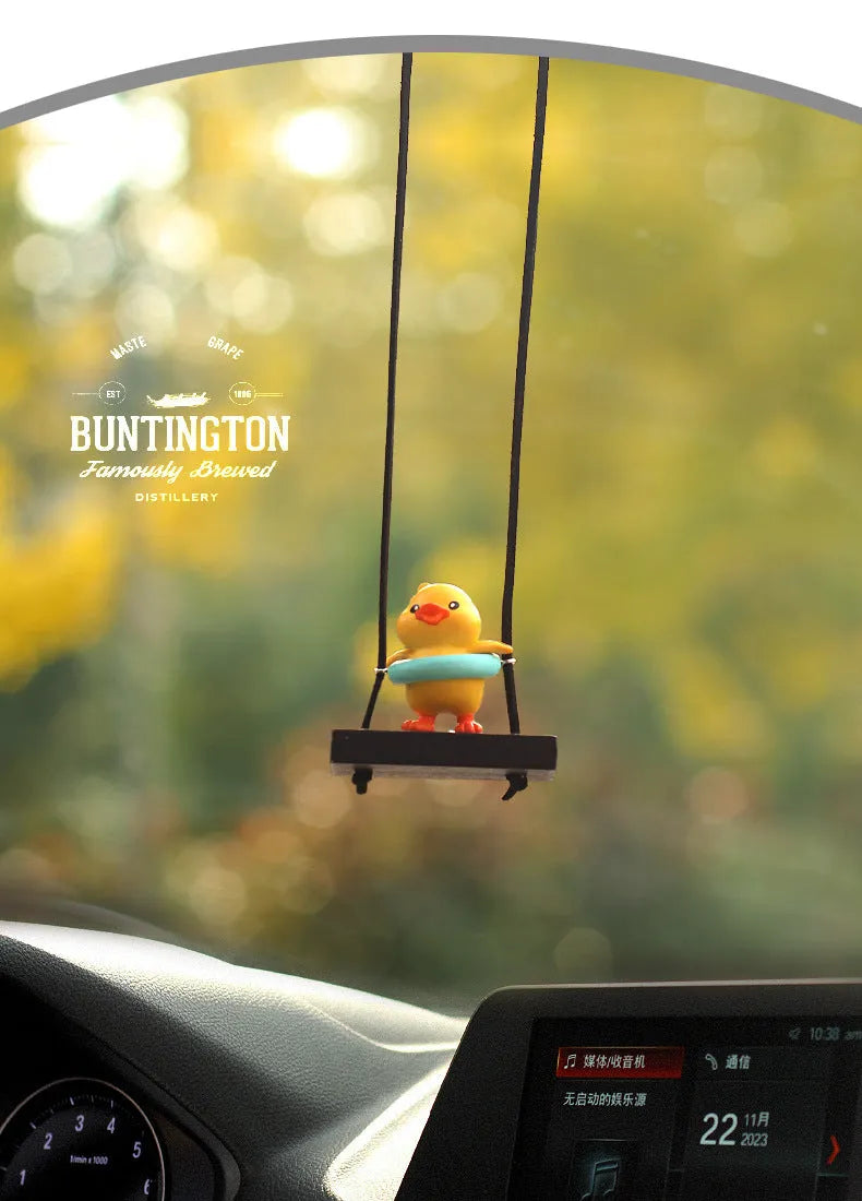 Yellow plastic duck car hanging ornament in cartoon style, shown in four design variants.