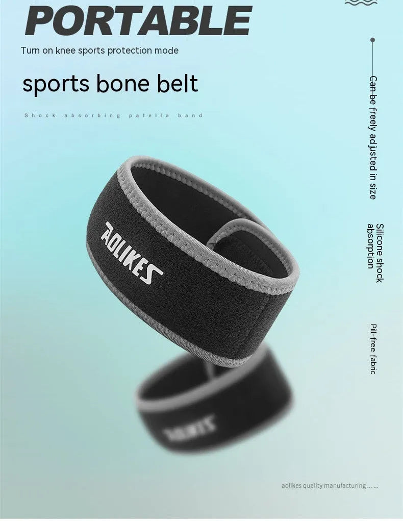 Black and grey patella retinaculum knee pad for sports protection.