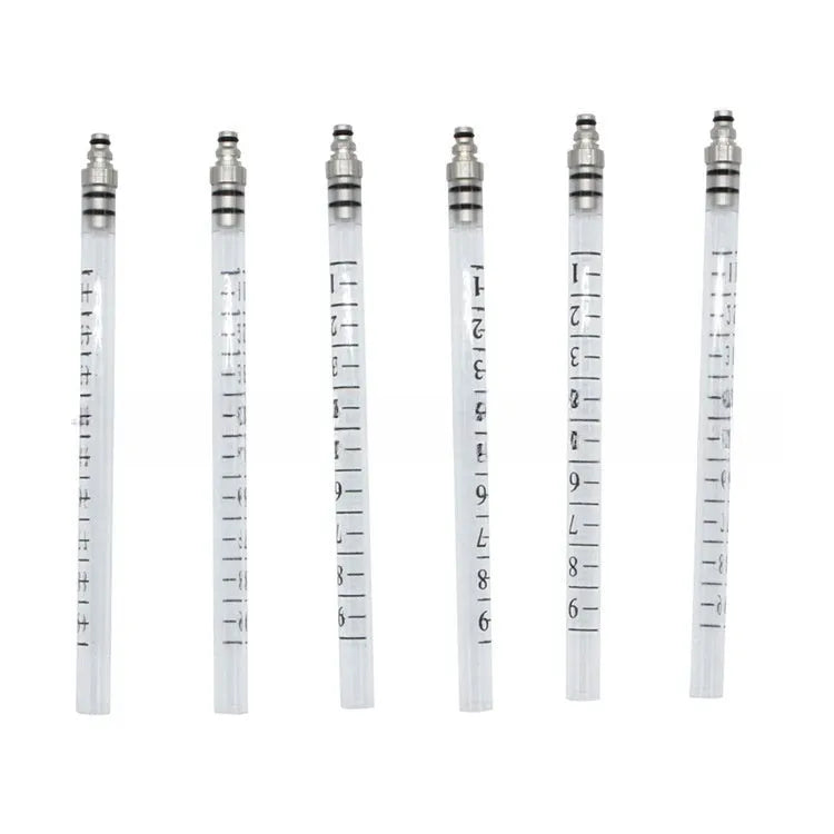 Brass and plastic fuel injection flow meter diagnostic tool for automotive fuel system testing