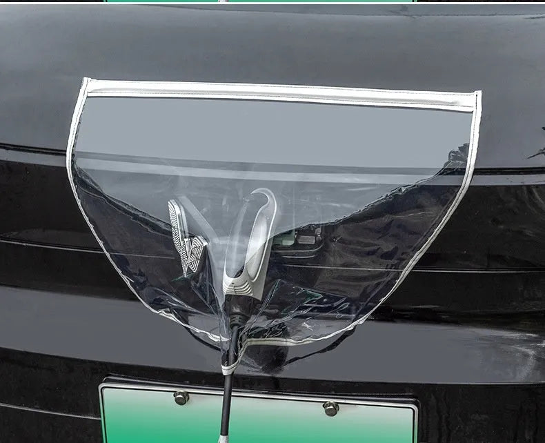 Black waterproof PVC cover with magnetic strips for an electric car charging gun port.