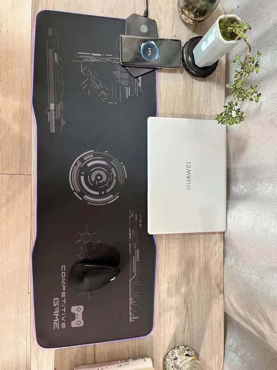 Black gaming mouse mat with mech-style graphics showing 300x800mm dimensions and TYPC interface