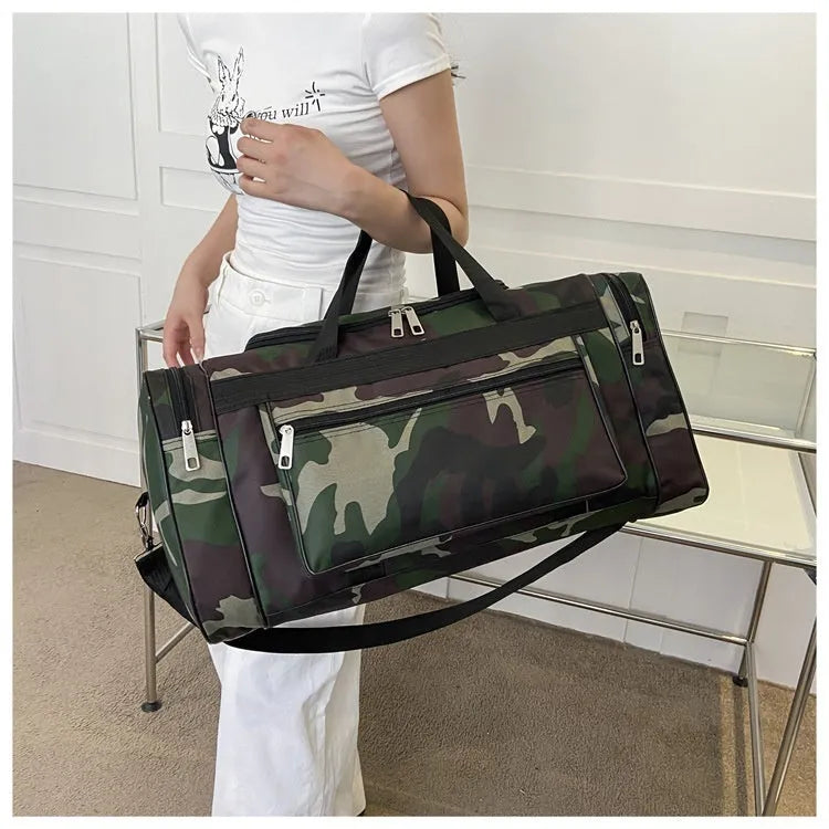 Camouflage patterned waterproof luggage bag with stripe lining, shown with capacity below 20 litres.