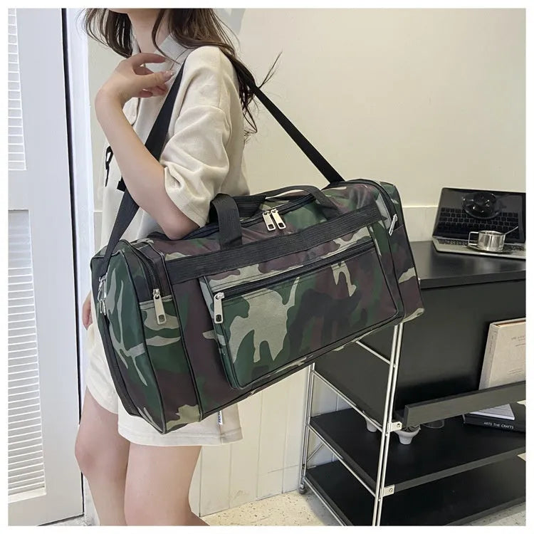 Camouflage patterned waterproof luggage bag with stripe lining, shown with capacity below 20 litres.