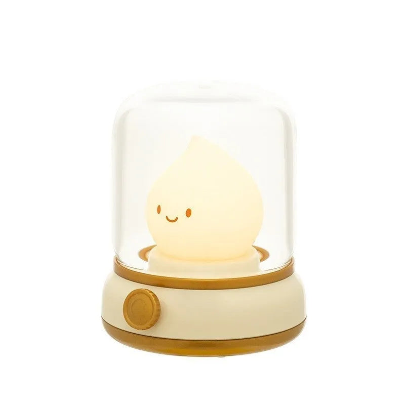 Green retro USB rechargeable desk lamp with adjustable knob on wooden table