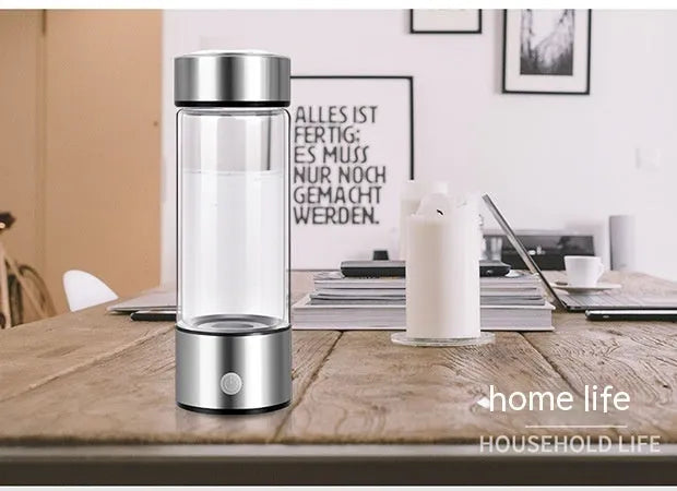 Silver hydrogen water generator bottle with borosilicate glass construction and rechargeable technology