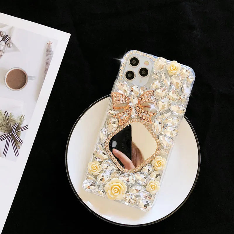 Handmade silicone phone case with rhinestone mirror diamond bow flower design in aura bright white flower for iPhone