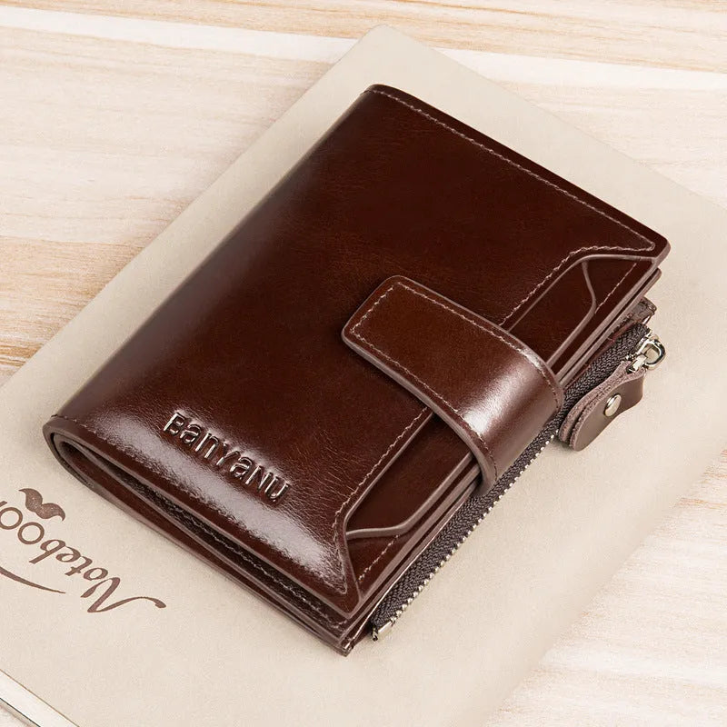 Vintage men's genuine leather oil wax short wallet with anti-theft RFID protection in brown two-fold style
