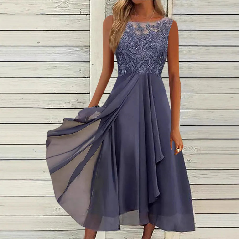Women's sleeveless lace and chiffon dress in a princess style, shown in green colour.
