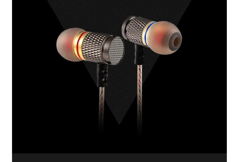 Close-up of wired in-ear headphones with metal subwoofer, TPE earplugs, and a 3.5mm L-bend plug on a silicone cable.