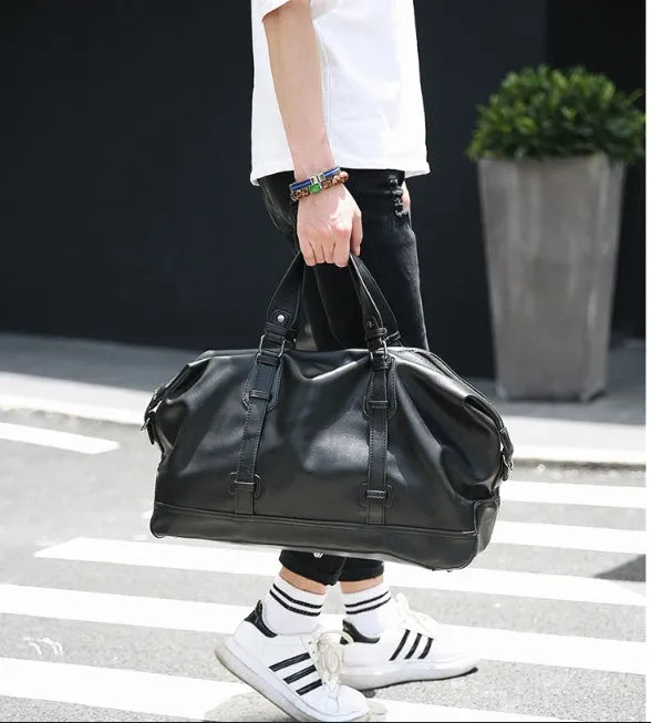 Large-capacity black PU leather handbag with shoulder strap and notebook compartment