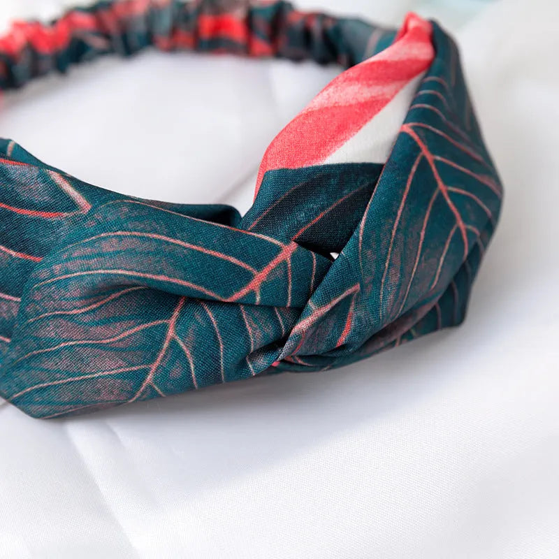 Red banana leaf pattern women's cloth headband with cross hair detail design