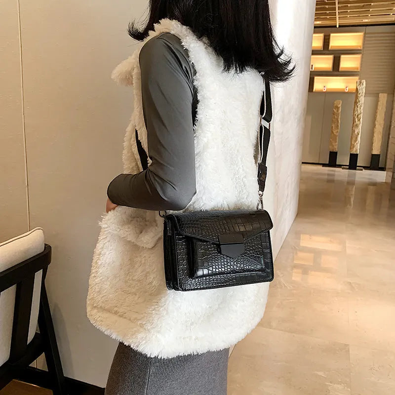 A PU fabric crossbody bag with an adjustable strap, shown in dark brown colour.