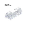 Transparent plastic self-adhesive cable clips for wire organisation in four size options