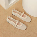 Women's beige mesh flat-heel pump with a square toe and buckle fastening.