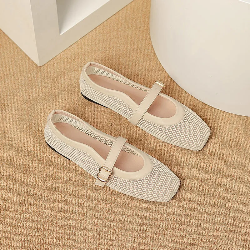 Women's beige mesh flat-heel pump with a square toe and buckle fastening.