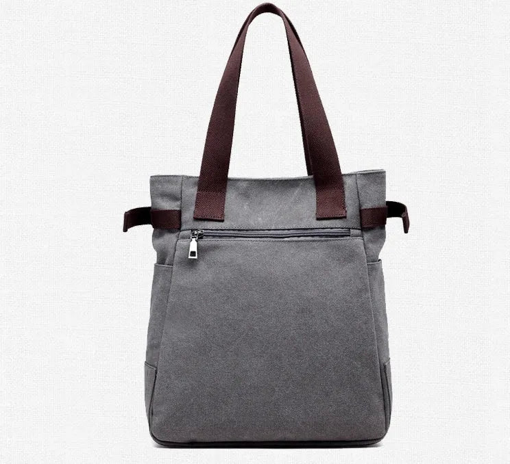 KVKY women canvas bag with plush cat applique in beige, showing shoulder strap and front pocket