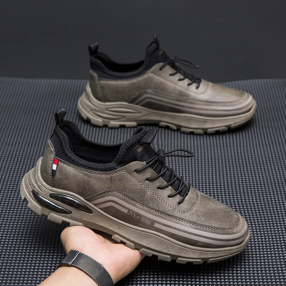 Men's black waterproof fleece-lined sneakers with low-top design and rubber sole