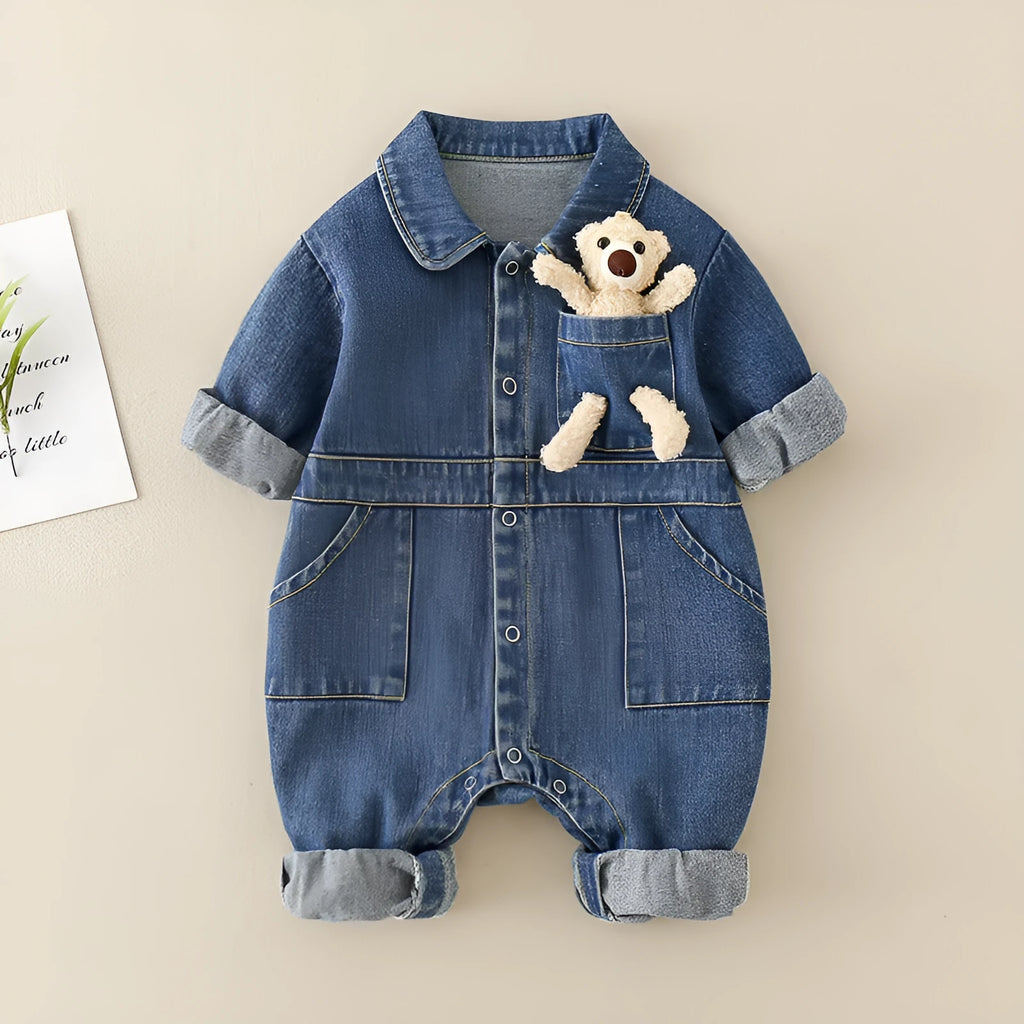 Baby boy wearing blue denim jumpsuit with teddy bear accessory, western style for Spring Festival