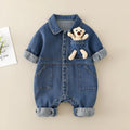Baby boy wearing blue denim jumpsuit with teddy bear accessory, western style for Spring Festival