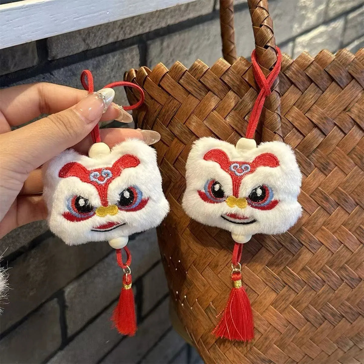 Chinese style blue plush lion keychain ornament with tassel and star stone decorative detail