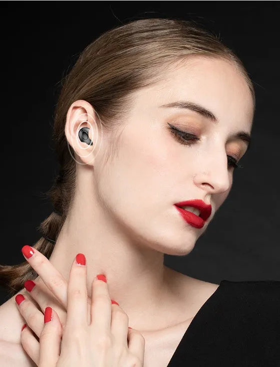 Black and white wireless in-ear Bluetooth headset with its Type-C charging case